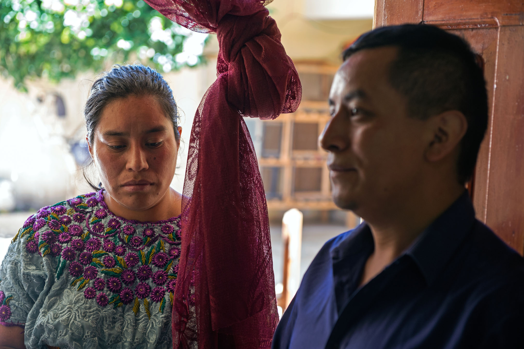 Gudelia Tamayac Tiguila becomes emotional as her husband, Humberto Menchú y Menchú, talks about their son’s illness.