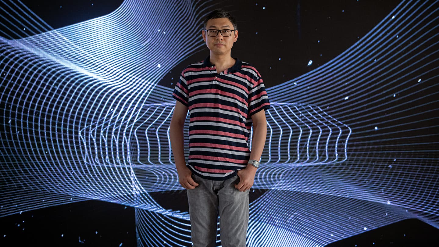 Dr Shu Wei, co-founder and Chief Technology Officer of ZES, in front of an LED screen at Nanyang Technological University (NTU) in Singapore.